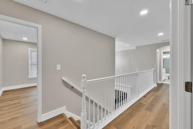 1547 Trilogy Park, Hoschton, GA 30548 - corridor with an upstairs landing, baseboards, wood finished floors, recessed lighting, and arched walkways