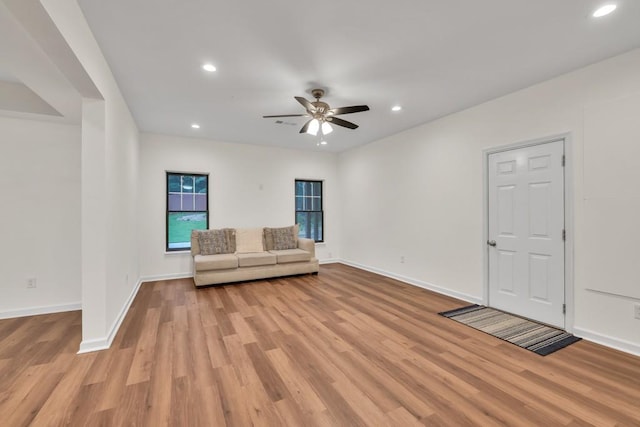 1547 Trilogy Park, Hoschton, GA 30548 - unfurnished room with light wood-style flooring, a ceiling fan, baseboards, and recessed lighting