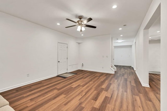 1547 Trilogy Park, Hoschton, GA 30548 - unfurnished living room featuring recessed lighting, wood finished floors, a ceiling fan, and baseboards