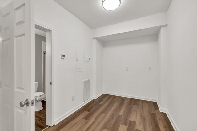 1547 Trilogy Park, Hoschton, GA 30548 - laundry area featuring dark wood-style flooring and baseboards