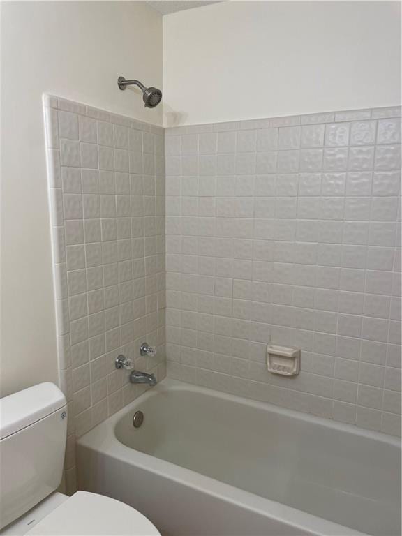 full bath with shower / washtub combination and toilet