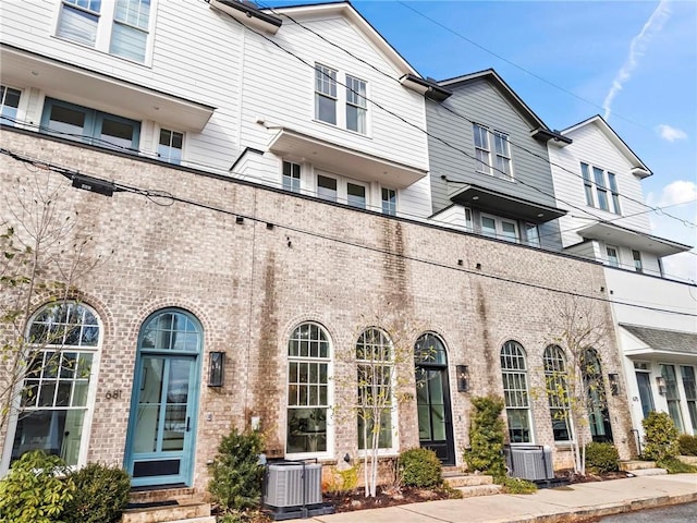 view of front of property featuring central AC unit