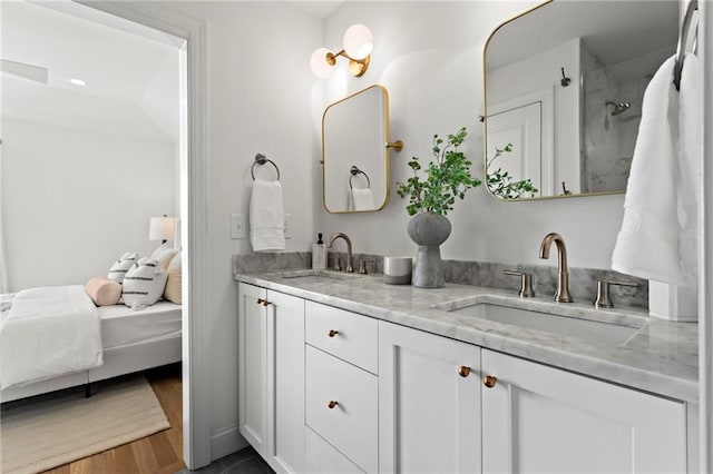 bathroom featuring vanity and wood-type flooring