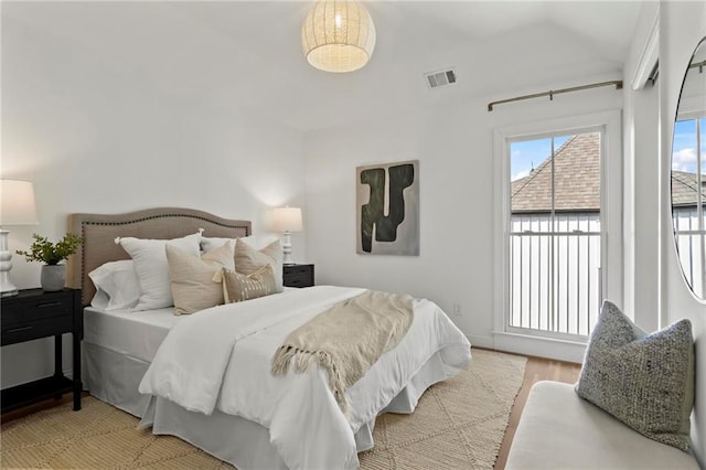 bedroom featuring hardwood / wood-style flooring