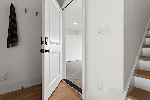 hallway with light wood-type flooring