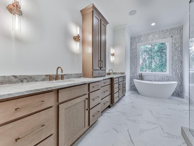 356 Henry Scott Rd, Ball Ground, GA 30107 - full bathroom with crown molding, a soaking tub, double vanity, marble look tile flooring, and baseboards