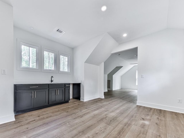 356 Henry Scott Rd, Ball Ground, GA 30107 - indoor wet bar featuring light wood finished floors, vaulted ceiling, baseboards, and recessed lighting
