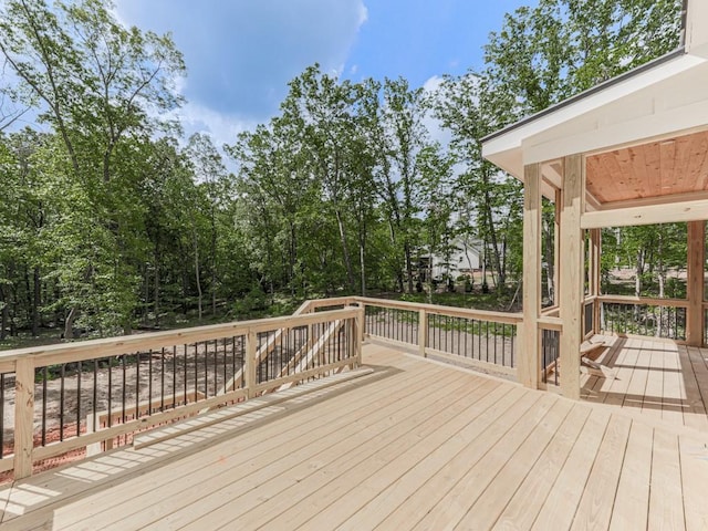 356 Henry Scott Rd, Ball Ground, GA 30107 - wooden deck with view of wooded area