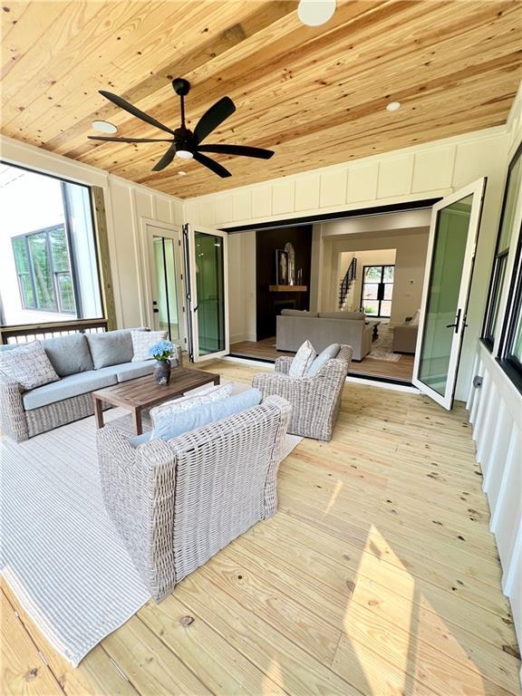 356 Henry Scott Rd, Ball Ground, GA 30107 - living room with wood ceiling, light wood-style floors, and ceiling fan