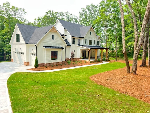 356 Henry Scott Rd, Ball Ground, GA 30107 - modern inspired farmhouse with board and batten siding, concrete driveway, a porch, a shingled roof, and a front yard