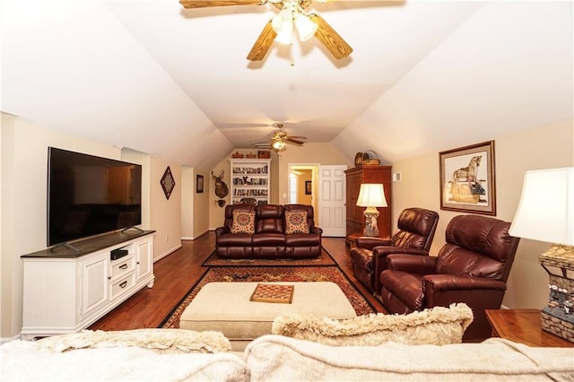 living room with dark hardwood / wood-style floors, ceiling fan, and lofted ceiling