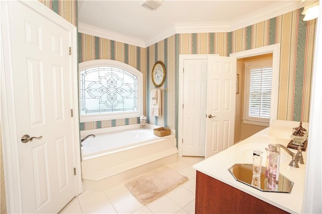 bathroom featuring a bathtub, crown molding, tile patterned flooring, and vanity