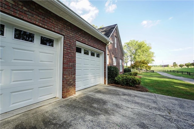 garage with a lawn