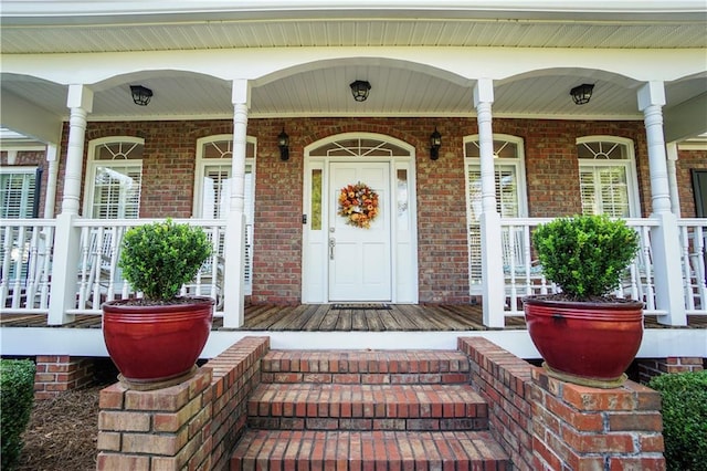 entrance to property with a porch