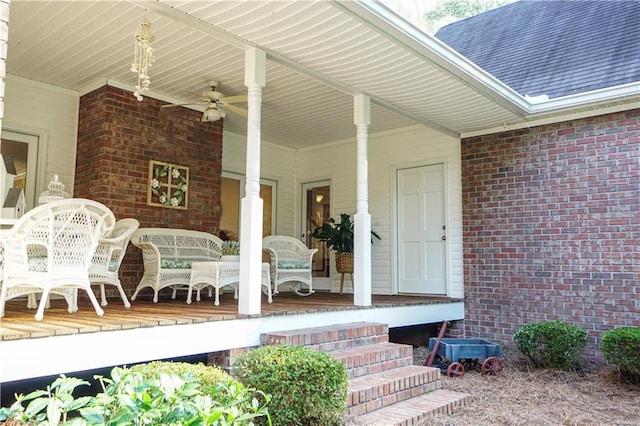 property entrance featuring a porch and ceiling fan