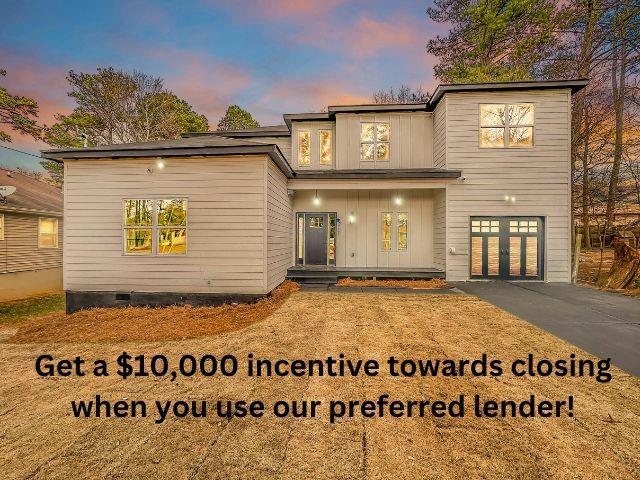 view of front of house featuring a garage, crawl space, and covered porch