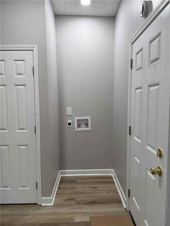 1300 Murphy Ave, Lagrange, GA 30240 - laundry room featuring electric dryer hookup, washer hookup, baseboards, and wood finished floors