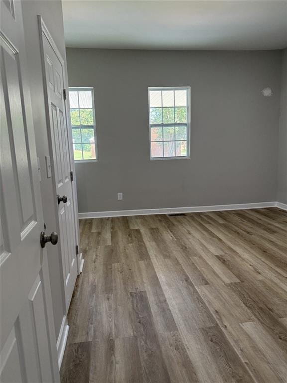 1300 Murphy Ave, Lagrange, GA 30240 - spare room with dark wood-type flooring and baseboards