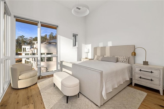 bedroom featuring hardwood / wood-style flooring