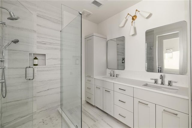 bathroom with vanity and walk in shower