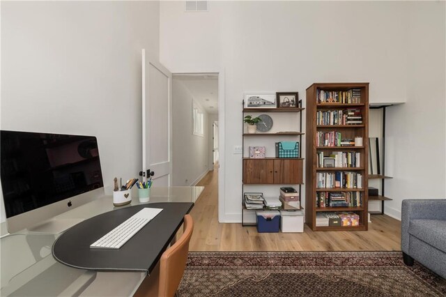 home office featuring light wood-type flooring