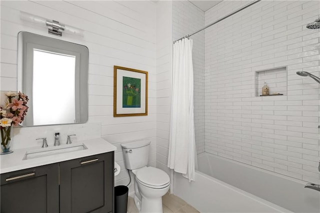 full bathroom with tile patterned flooring, vanity, toilet, and shower / bathtub combination with curtain