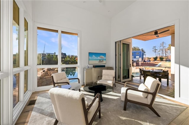 interior space featuring ceiling fan and light hardwood / wood-style flooring