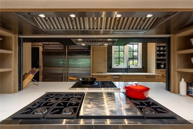 170 Autry Trl, Johns Creek, GA 30022 - kitchen featuring appliances with stainless steel finishes, exhaust hood, and light stone countertops