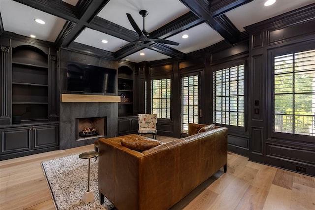 170 Autry Trl, Johns Creek, GA 30022 - living area with coffered ceiling, a fireplace, built in features, light wood finished floors, and beam ceiling