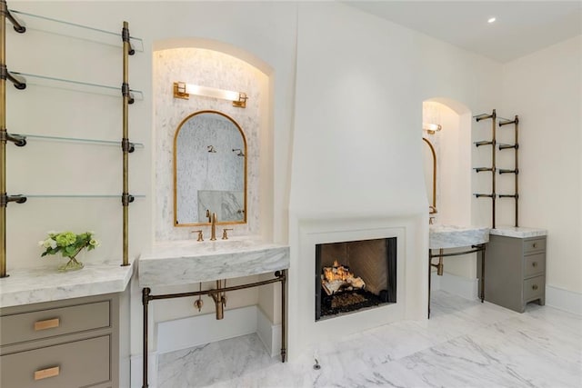 170 Autry Trl, Johns Creek, GA 30022 - bathroom with marble look tiles and a sink