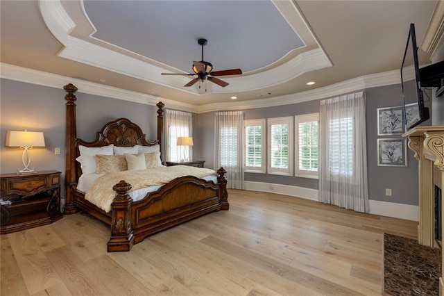 170 Autry Trl, Johns Creek, GA 30022 - bedroom with a raised ceiling, ornamental molding, wood finished floors, a fireplace with flush hearth, and recessed lighting
