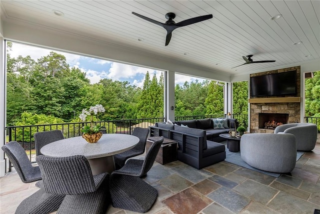 170 Autry Trl, Johns Creek, GA 30022 - view of patio / terrace with an outdoor living space with a fireplace, ceiling fan, and outdoor dining area