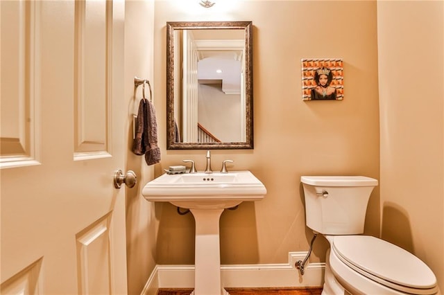 bathroom with toilet and sink