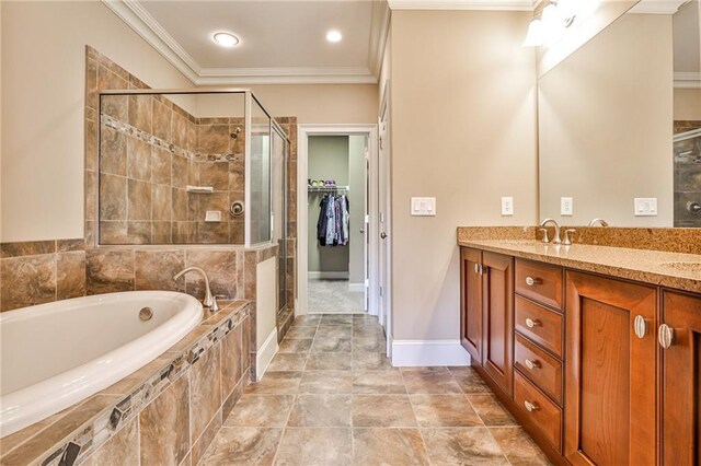 bathroom with shower with separate bathtub, ornamental molding, and vanity