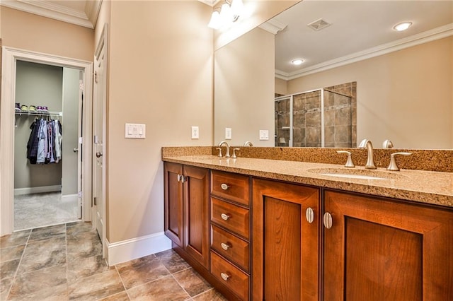 bathroom featuring crown molding, walk in shower, and vanity