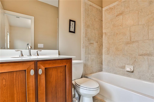 full bathroom with tub / shower combination, vanity, and toilet