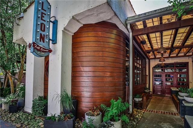 view of home's exterior featuring french doors