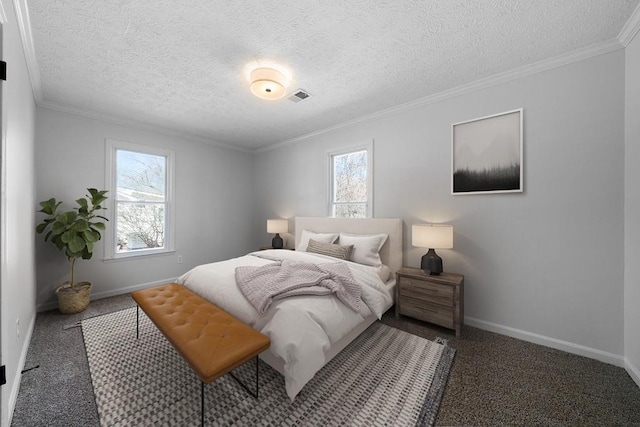 carpeted bedroom featuring multiple windows, visible vents, and crown molding