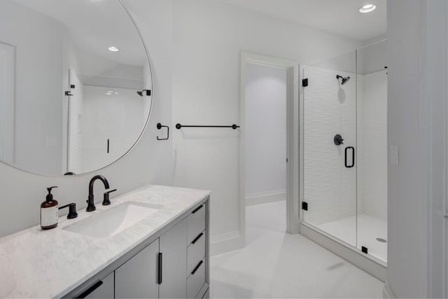 full bath featuring vanity, a shower stall, recessed lighting, and tile patterned flooring