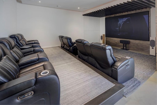 home theater featuring carpet flooring and baseboards