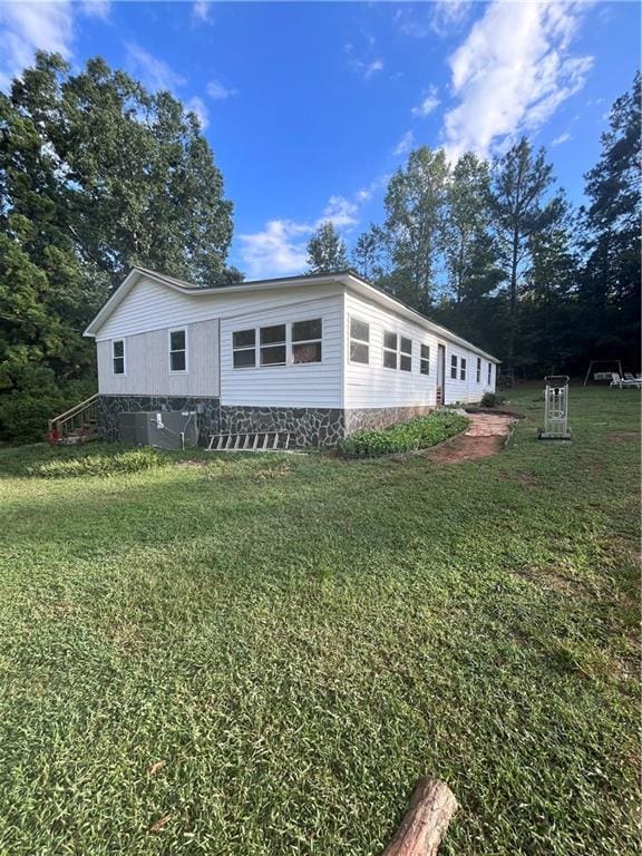 exterior space with a lawn