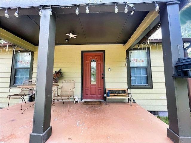 entrance to property with covered porch