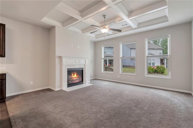 2320 Ivy Birch Ln, Buford, GA 30519 - unfurnished living room featuring coffered ceiling, a fireplace with flush hearth, a ceiling fan, beamed ceiling, and carpet floors