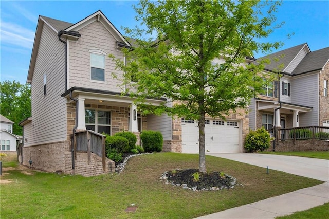 2320 Ivy Birch Ln, Buford, GA 30519 - craftsman-style house featuring concrete driveway, a front yard, a porch, and brick siding
