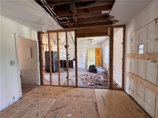 interior space featuring a ceiling fan