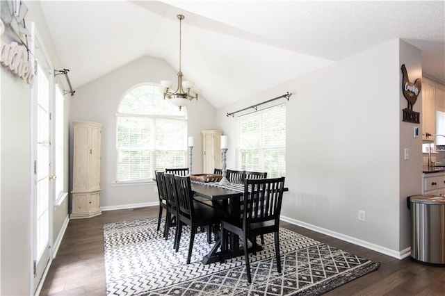 89 Paul Cir, Jasper, GA 30143 - dining area with healthy amount of natural light, dark wood-style floors, lofted ceiling, and a chandelier