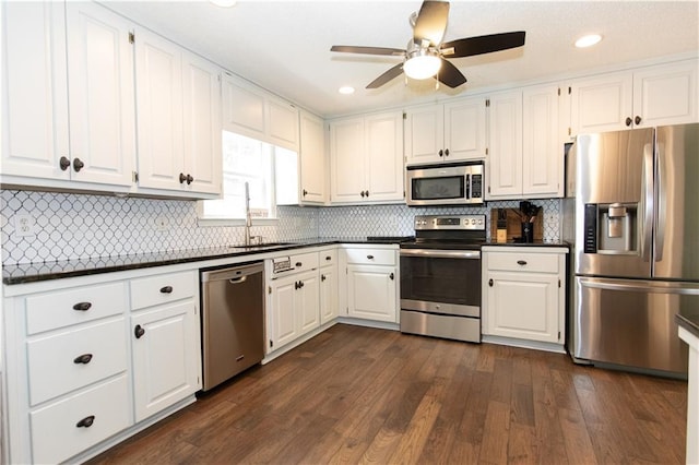 89 Paul Cir, Jasper, GA 30143 - kitchen featuring stainless steel appliances, dark countertops, ceiling fan, white cabinetry, and recessed lighting