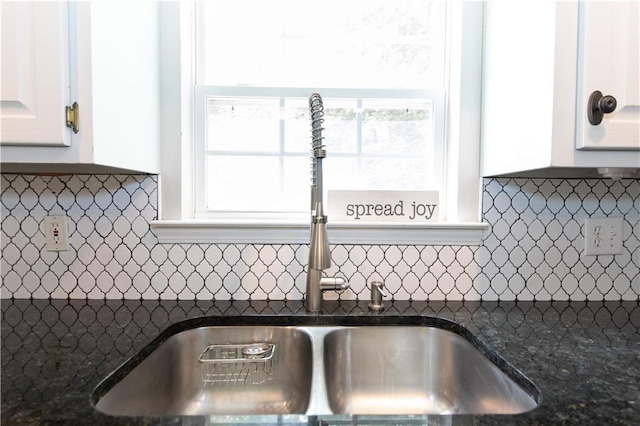 89 Paul Cir, Jasper, GA 30143 - kitchen view of white cabinetry, decorative backsplash, and dark stone countertops