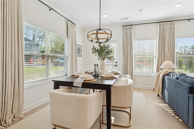 432 Carrera Ln, Acworth, GA 30102 - dining room featuring visible vents, baseboards, a notable chandelier, and light wood-style floors