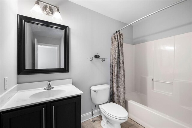 full bathroom with tile patterned flooring, vanity, toilet, and shower / tub combo